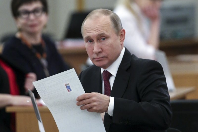 Bau cu Nga 2018: Tong thong Putin di bo phieu o Moscow hinh anh