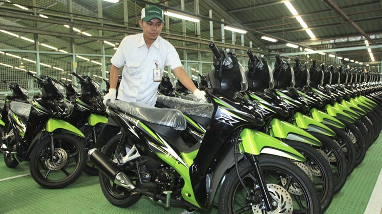 Honda chuan bi gioi thieu Revo FI hinh anh