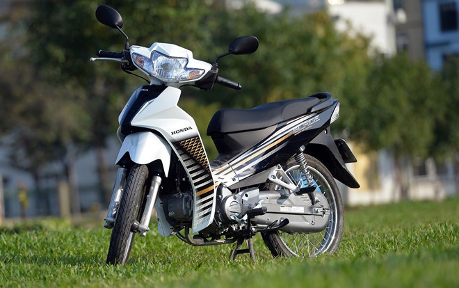 Honda, Yamaha cung tung chieu den xe mat cap o Viet Nam hinh anh