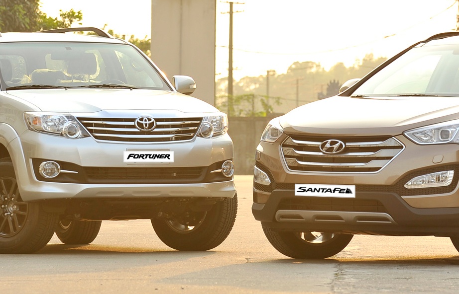 Cuoc doi dau giua Toyota Fortuner va Hyundai Santa Fe hinh anh