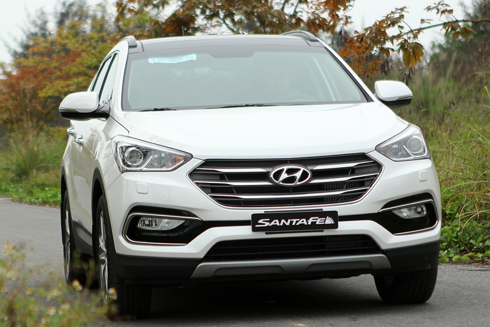 Chi tiet Hyundai Santa Fe 2016 ban may dau gia 1,3 ty dong hinh anh