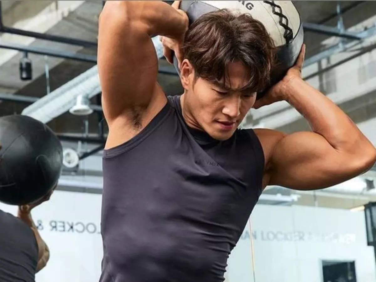 Kim Jong Kook khong dung thuoc tang co bap hinh anh