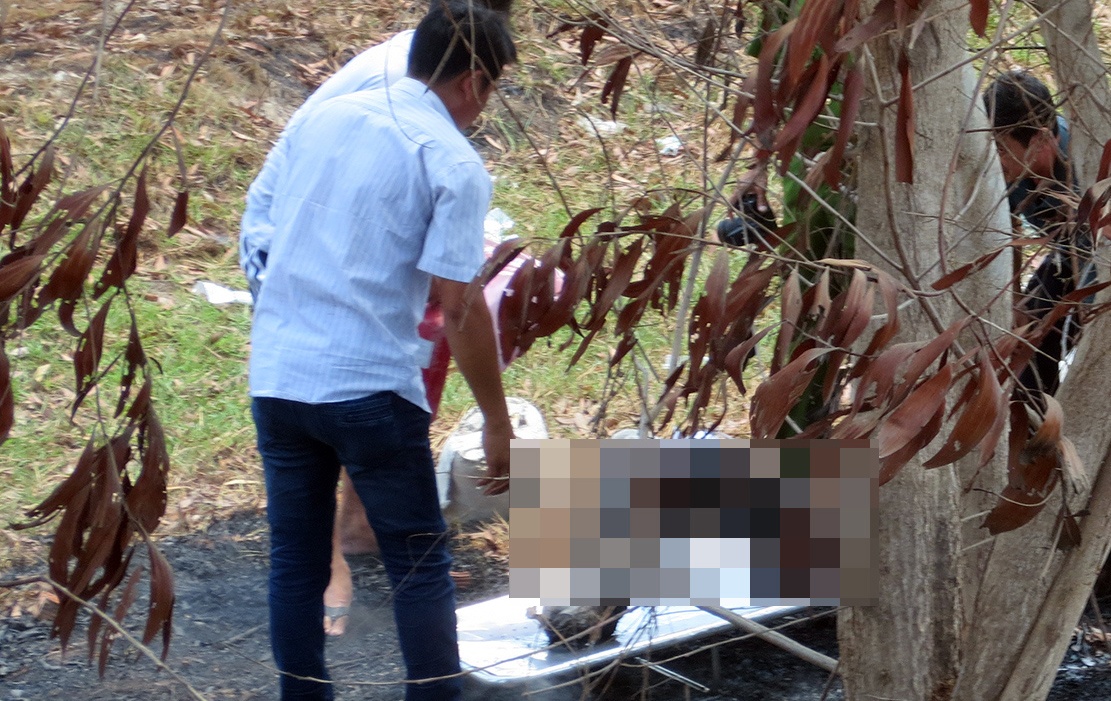 Canh sat dieu tra vu nguoi dan ong boc chay ven duong hinh anh