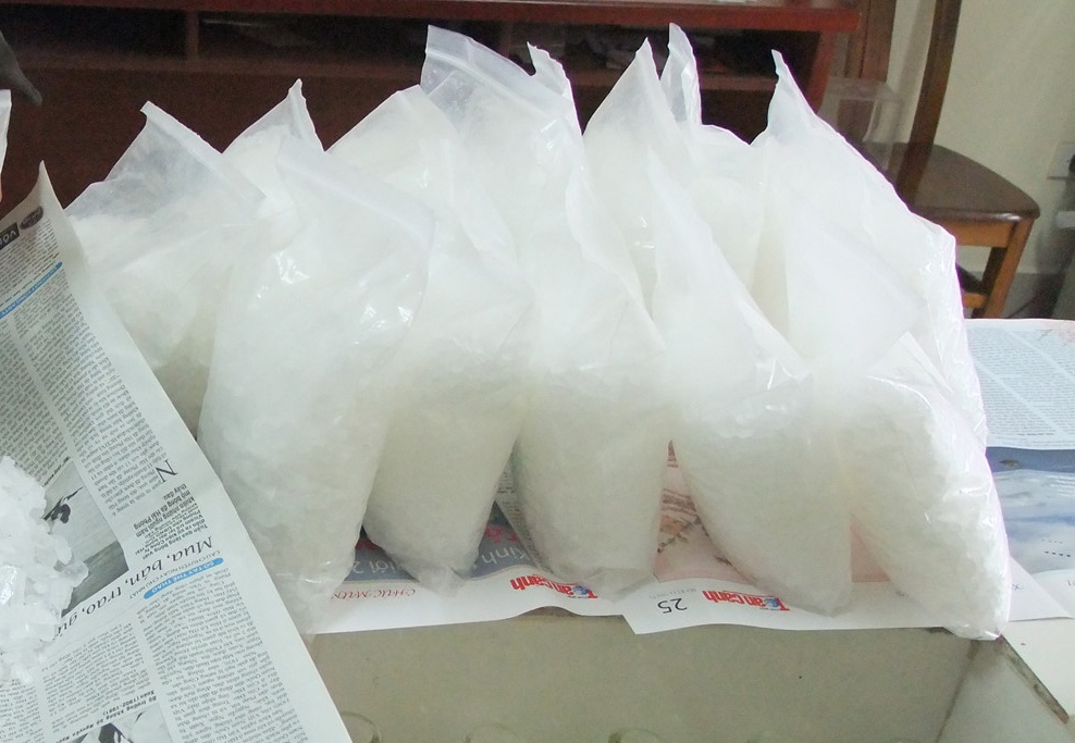 Hai nguoi dan ong dua 14 kg ma tuy da len tau hinh anh