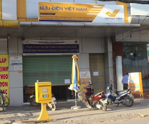 Nguoi dan bat ke xong vao buu dien cuop 60 trieu dong hinh anh