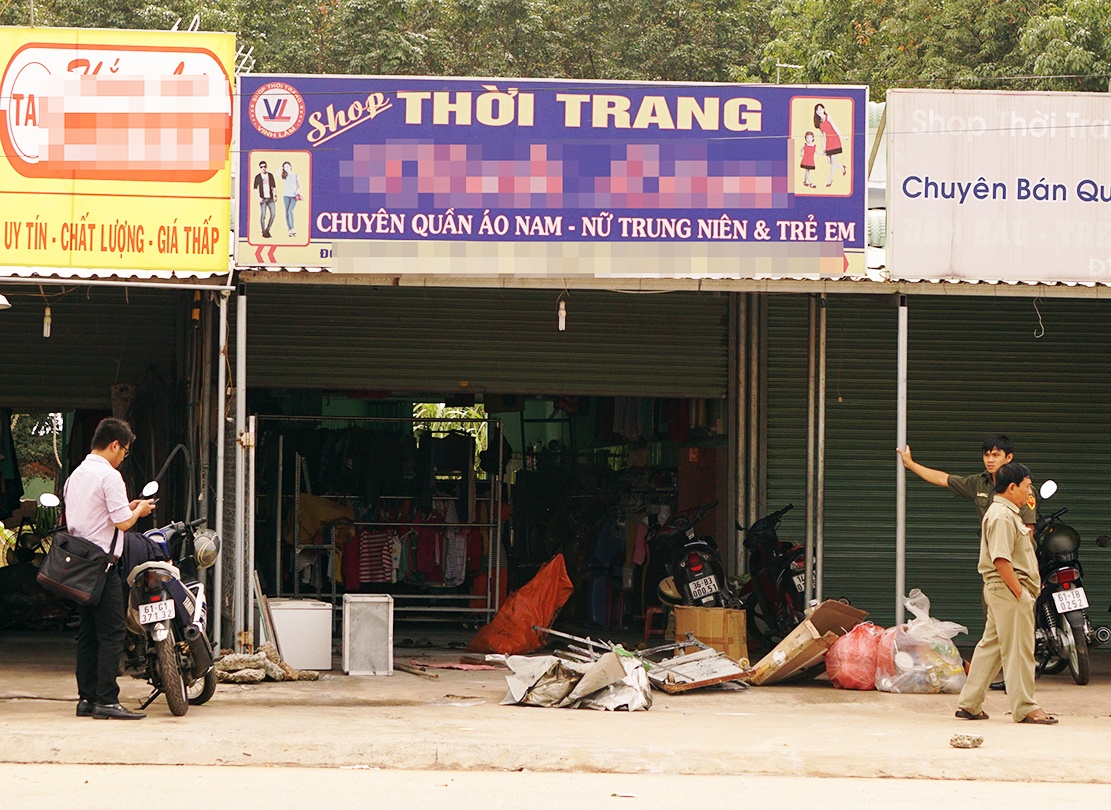Canh sat dieu tra vu chay o shop thoi trang luc rang sang hinh anh