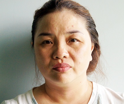Nguoi phu nu lua dao tien ty bi bat sau 9 nam tron truy na hinh anh