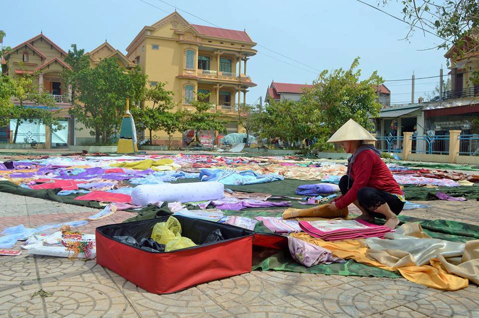 nguoi dan ve nha sau bao anh 10