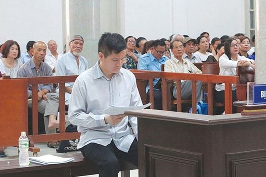 Xet xu tien si 'day hoc lam giau' - phien toa ky la giua long Ha Noi hinh anh