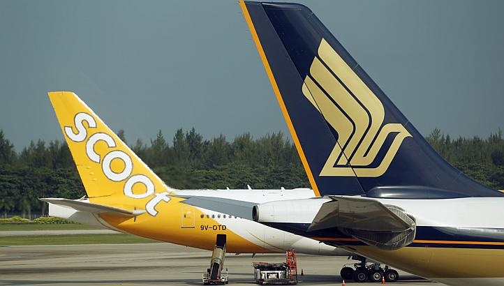 Hang bay Singapore thuong 8 thang luong cho nhan vien hinh anh