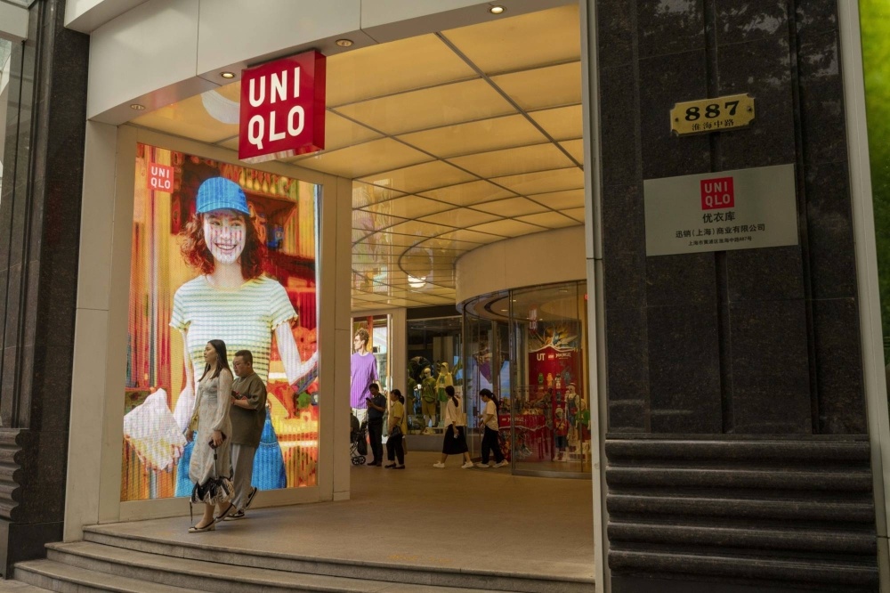 Ong chu Uniqlo dat doanh thu cao ky luc hinh anh