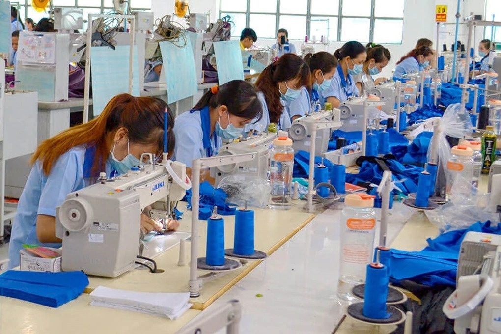 Doanh nghiep det may TP.HCM trang don hang suot 18 thang hinh anh