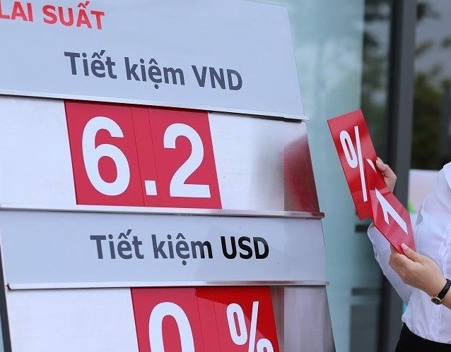 Ngan hang tang manh lai suat tiet kiem sau Tet hinh anh