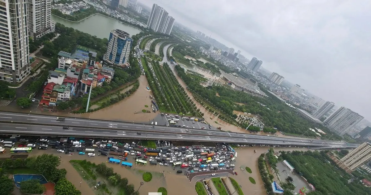 Thay gi tu viec Ha Noi bi 'nhan chim' sau tran mua lon? hinh anh