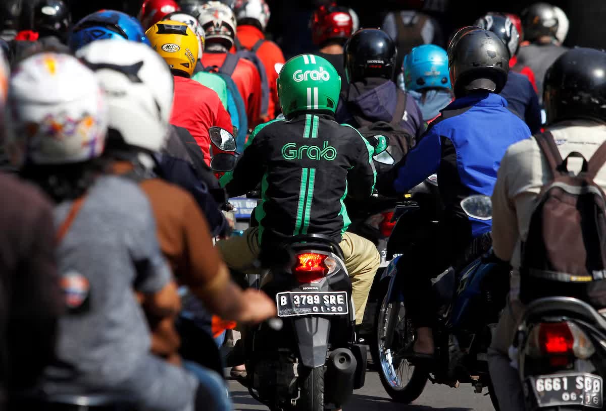 Tong thong Indonesia yeu cau siet tran chiet khau Grab, Gojek ve 8% hinh anh