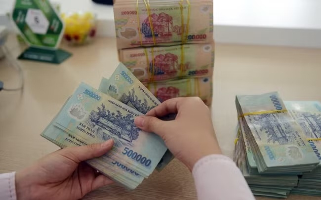 Bo Tai chinh: Khong cam tra luong tren 5 trieu bang tien mat hinh anh