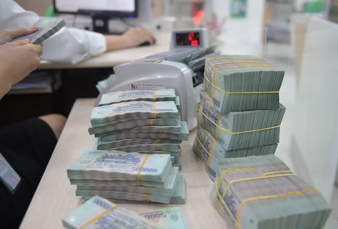 Ly do ngan hang tang manh lai suat huy dong hinh anh