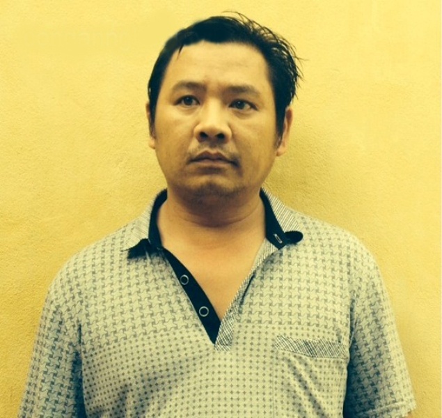 Phạm Chí Tình tại cơ quan điều tra.