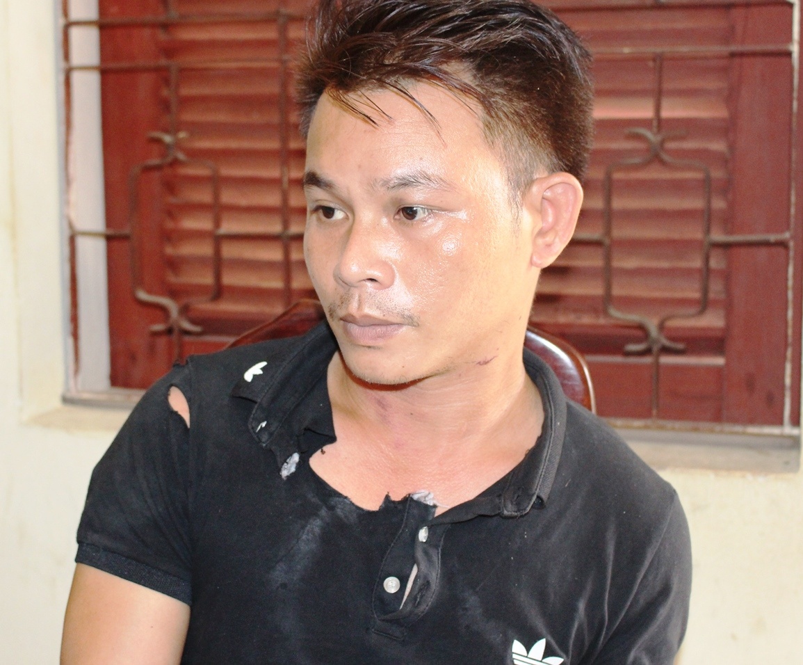 Đinh Văn Chiến tại cơ quan điều tra. Ảnh: N.A.