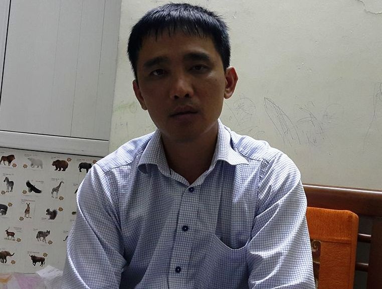 Can bo ngan hang danh nhan vien cay xang anh 2