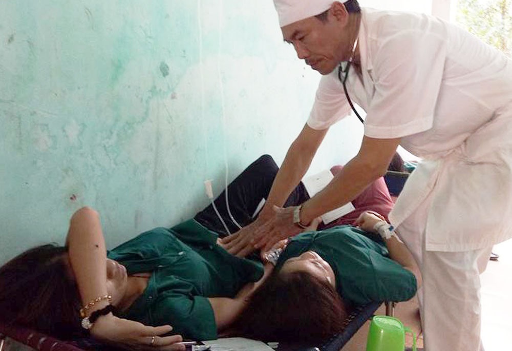 Hon 50 cong nhan may nhap vien nghi ngo doc thuc pham hinh anh