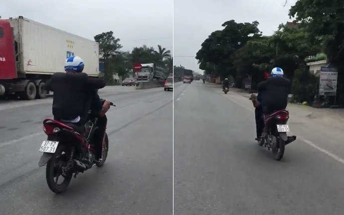 Nam thanh nien dung chan lai xe may tren quoc lo hinh anh
