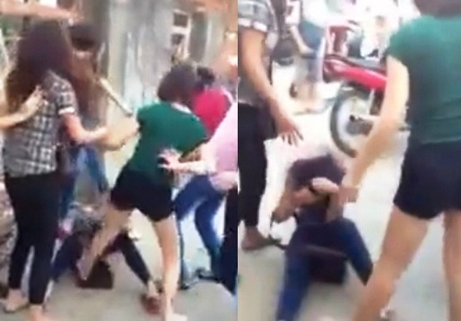 Clip nu sinh Bien Hoa bi danh hoi dong da man tren pho hinh anh