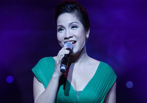 My Linh the hien 'Tinh yeu Ha Noi' cung bo chong hinh anh