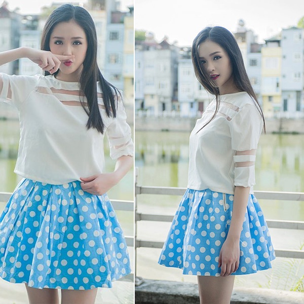 Á hậu Hoàng Anh là người đẹp rất yêu thích họa tiết chấm bi. Cô thường chọn những chiếc váy chấm bi dáng xòe ngắn ngang đùi hoặc chấm đầu gối để mix cùng áo sơ mi trắng nền nã. Kiểu mix này giúp cô gái sinh năm 1994 rất dễ thương và tươi mới.