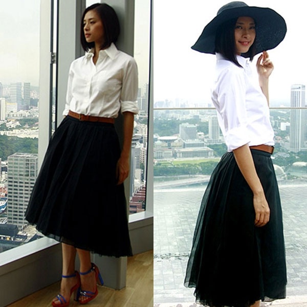 Ngô Thanh Vân quá đỗi dịu dàng và cổ điển trong chiếc váy đen xòe mix cùng sơ mi trắng.