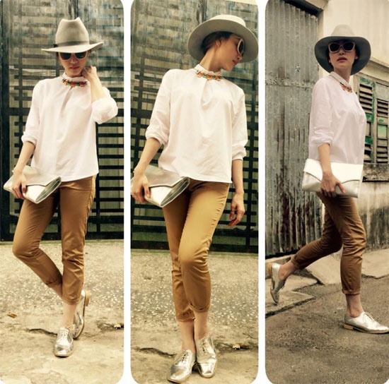 Quần kaki xắn gấu phối với áo kiểu cách điệu, giày ánh bạc như  Ngân Khánh cho bạn sở hữu vẻ ngoài phong cách.