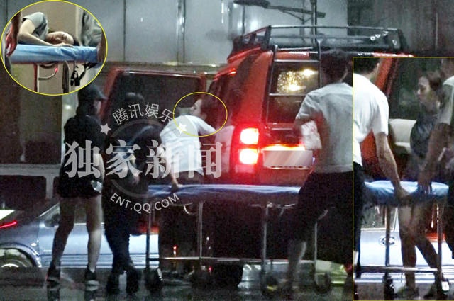 Hình ảnh Trương Huệ Muội nhập viện ngay sau đó Cô được các chuyên gia y tế đưa đi di chuyển bằng cáng.