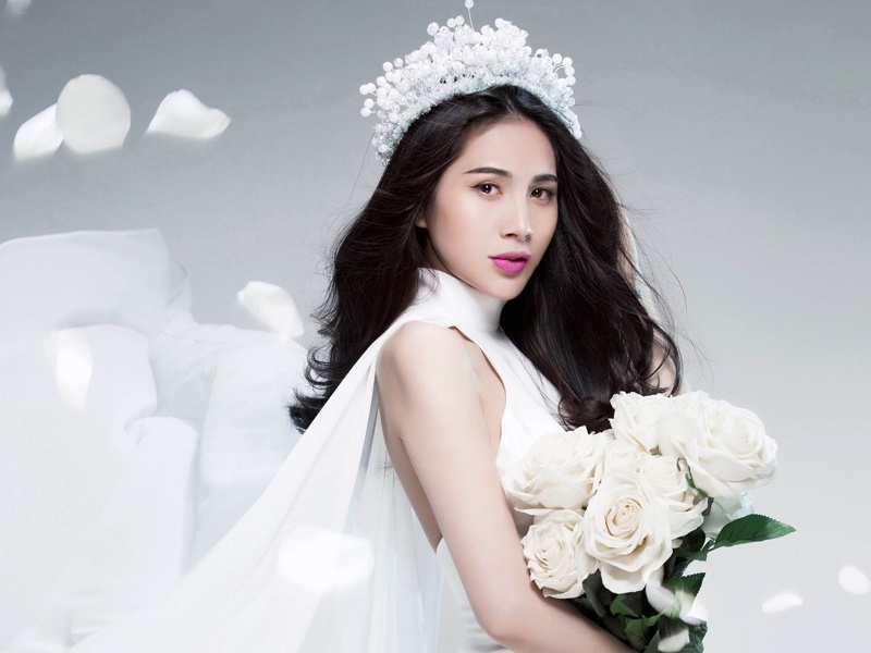 Thuy Tien long lay trong hinh anh co dau hinh anh