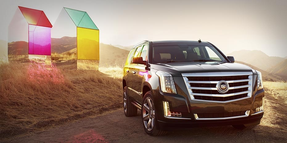 Cadillac Escalade 2015 voi gia ban tu 65.000 USD hinh anh