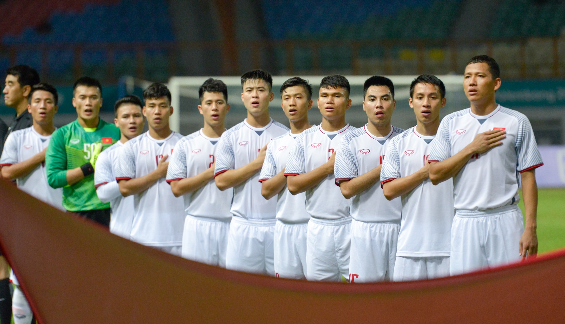 Olympic Viet Nam vuot qua vong bang ASIAD anh 1