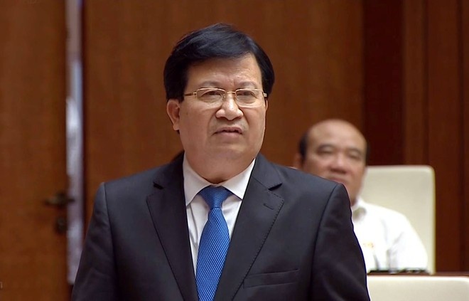 Chu tich Quoc hoi chat van Bo truong Xay dung hinh anh