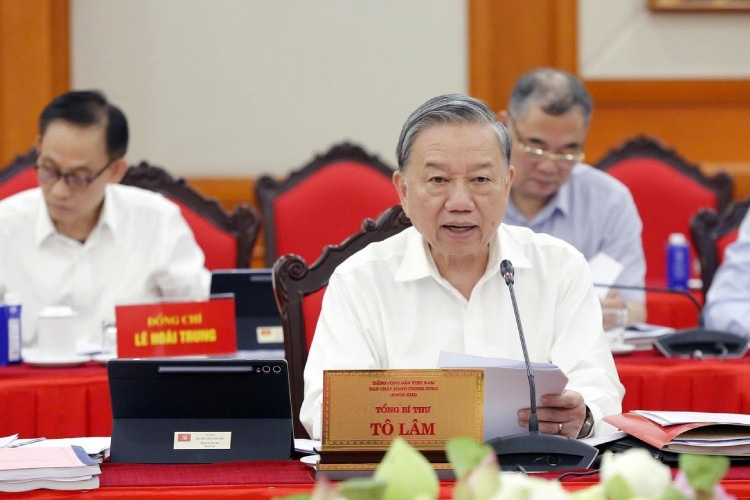 Tap the Bo Chinh tri lam viec voi Ban Thuong vu Thanh uy Ha Noi hinh anh