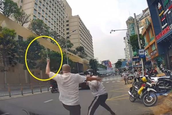 Lai xuat hien canh cam hung khi duoi danh nguoi tren duong pho TP.HCM hinh anh