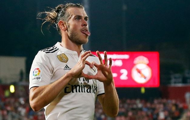 Bale lai no sung giup Real vuot Barca tren bang xep hang La Liga hinh anh
