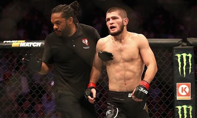 Nha vo dich UFC tiet lo ly do tan cong McGregor sau tran dau hinh anh