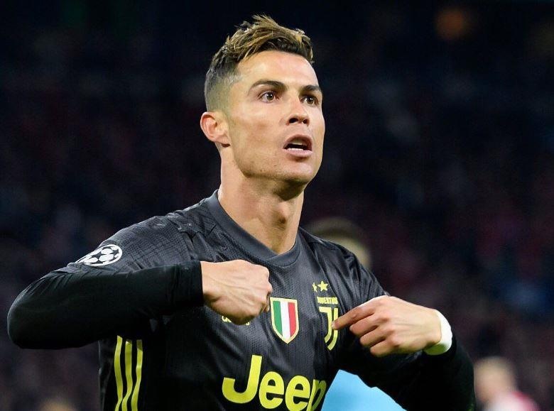 Ronaldo linh xuong doi hinh hay nhat tu ket luot di cup chau Au hinh anh