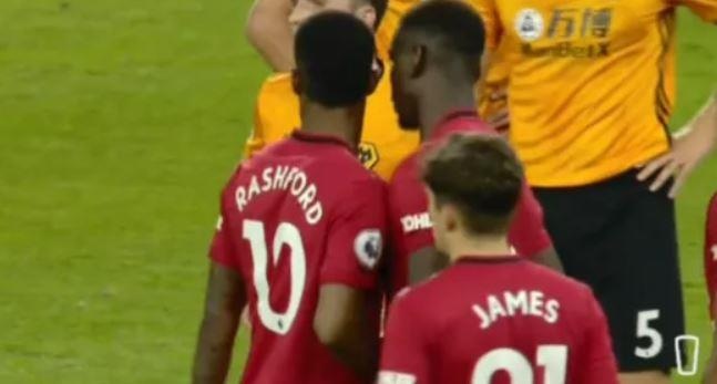 Pogba tranh da penalty voi Rashford anh 1