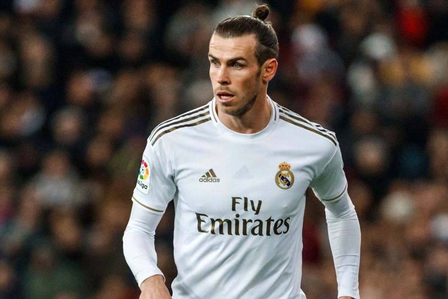 Courtois xuat sac giup Real gianh 3 diem o tran mo man nam moi hinh anh