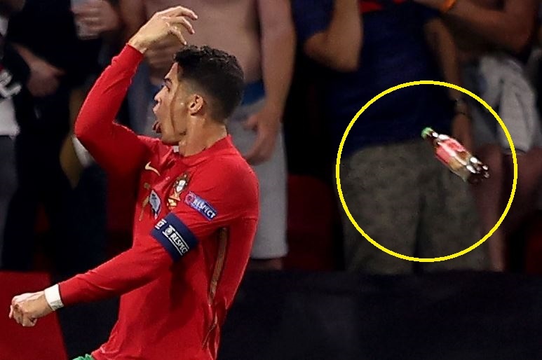 Ronaldo bi CDV nem chai nuoc ngot hinh anh