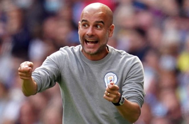 Phan ung cua Pep Guardiola khi Ronaldo ve MU hinh anh