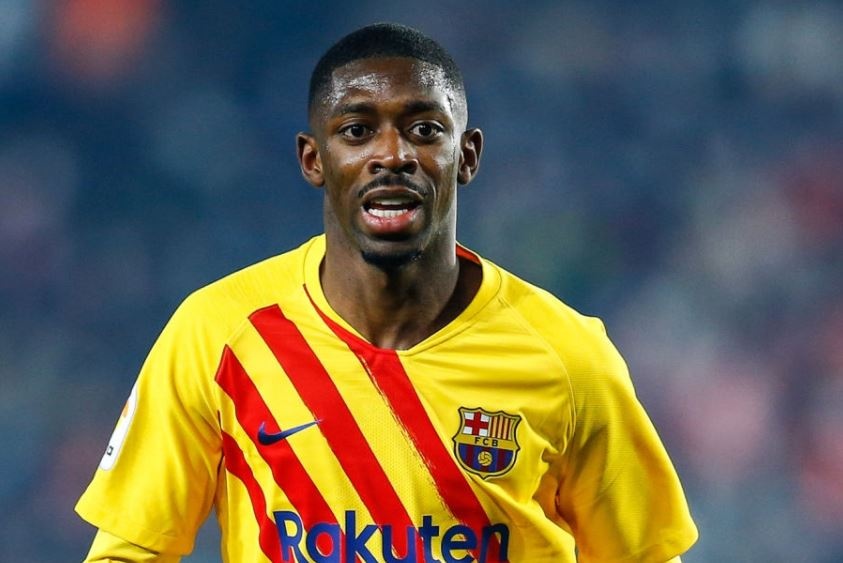 HLV Xavi doi thai do voi Dembele hinh anh