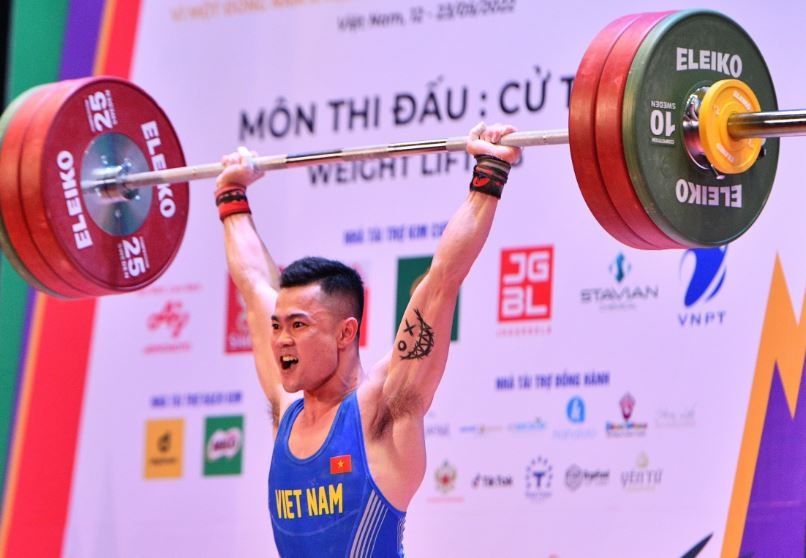 SEA Games sang 13/5: Cu ta Viet Nam co HCV dau tien hinh anh