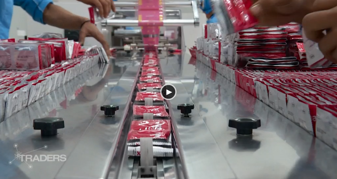 Ben trong nha may bao cao su lon nhat the gioi hinh anh