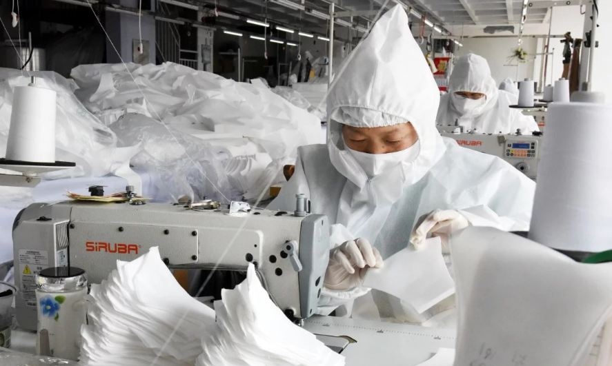 San xuat o at, Trung Quoc co nguy co thua khau trang hinh anh