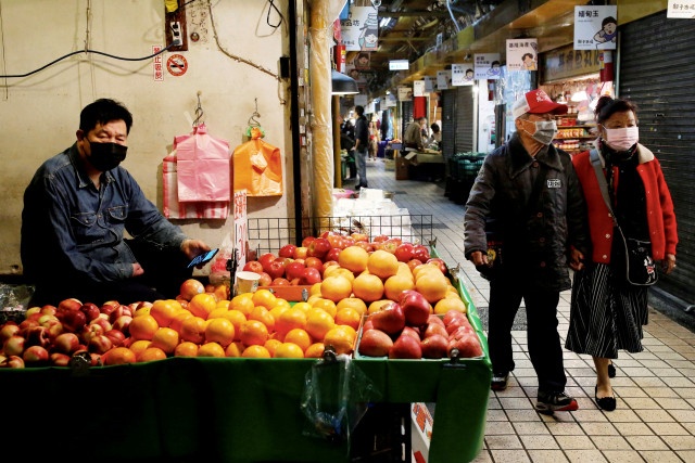 Dai Loan khuyen khich nguoi dan ‘mua cang nhieu cang tot’ hinh anh